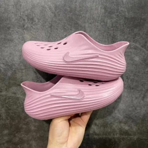 Nike Light Pink Wave textured Slip ons for