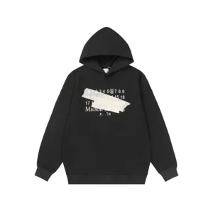 Maison Margiela Black Hoodie: Street Style