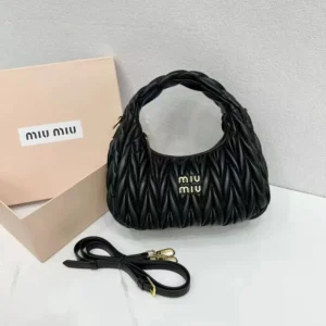 Miu Miu Black Quilted Handbag: Luxe