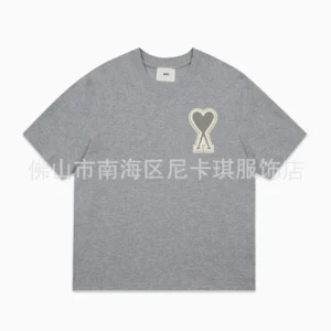 AMIRI Grey T shirt: Stylish Heart Emblem for