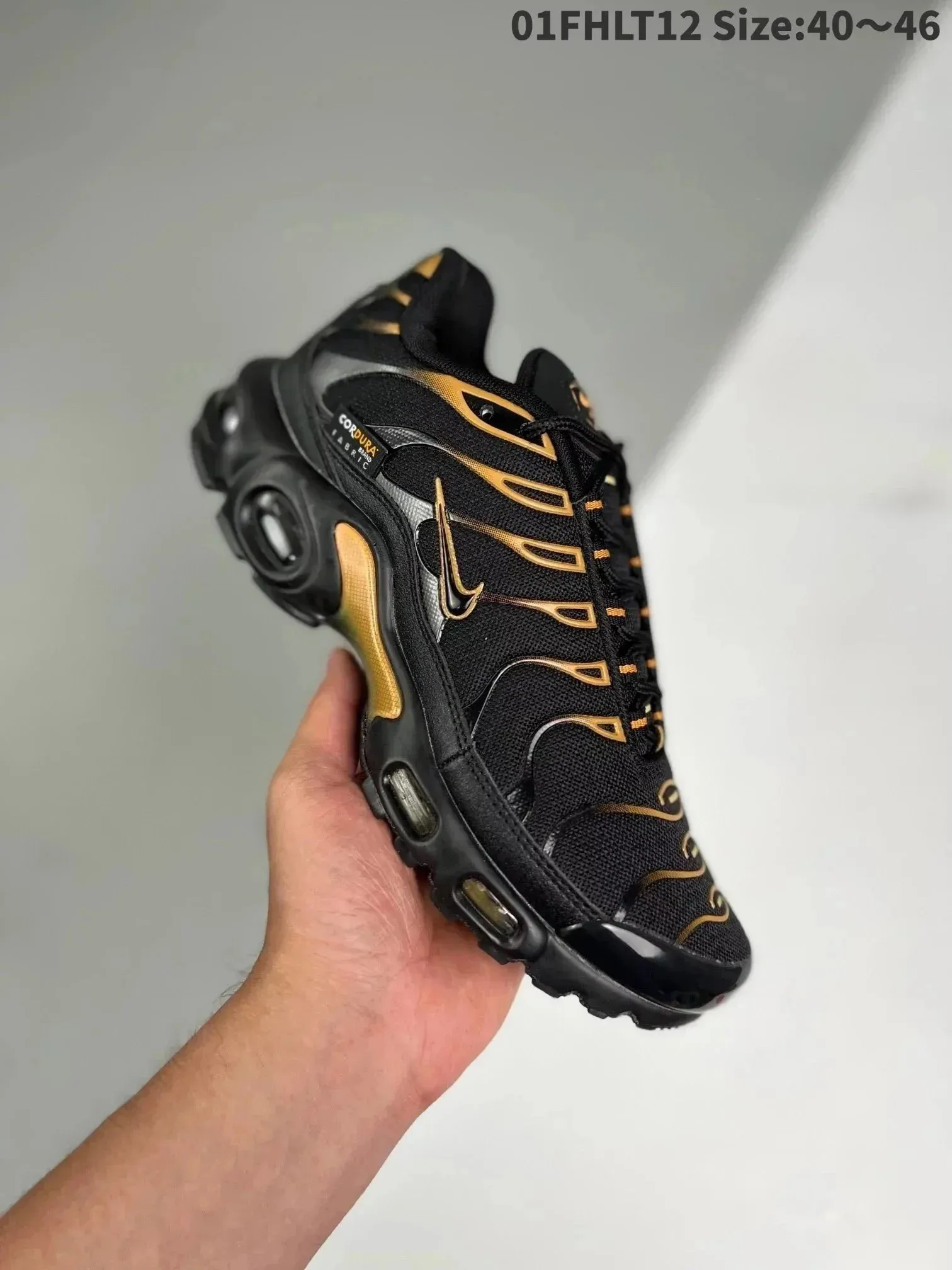 Nike Air Max Plus Black Gold Sporty Sneakers
